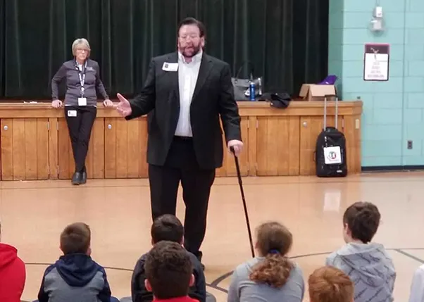 Stroke Survivor Giving Speech to Children